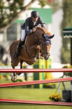 Joseph Stockdale of Great Britain, riding Ebanking, competes in the 2025 Spruce Meadows Masters on