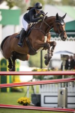 Alessandra Reich of Austria, riding Oeli R, competes in the 2025 Spruce Meadows Masters on