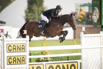 Max Kuhner of Austria, riding Elektric Blue P, competes in the 2025 Spruce Meadows Masters on