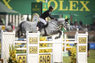 Kevin Jochems of the Netherlands, riding Csquetto Van De Helle competes in the 2025 Spruce Meadows