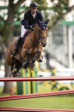 Ben Maher of Great Britain, riding Enjeu De Grisien competes in the 2025 Spruce Meadows Masters on