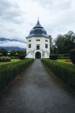 Baroque pavilion in the park of Admont Abbey under a cloudy sky, Admont, Styria, Austria