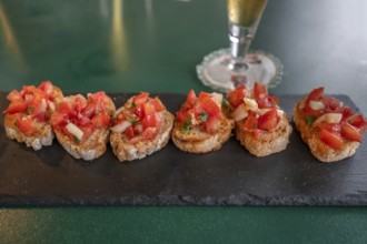Crostini on a slate platter, served in a garden restaurant, Franconia, Bavaria, Germany