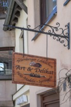 Nose sign at a shop for gingerbread and baking accessories, Trödelmarkt 45, Nuremberg, Central