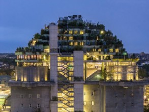 Aerial view of the Hamburg bunker on Heiligengeistfeld during the blue hour with illuminated floors