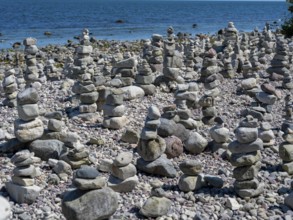 Piled stones on the shore of the island of Stora grundet on the northern tip of the Swedish island