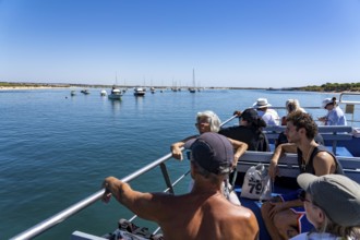 Ride on the Silnido ferry from Tavira on the Gilão River to the beach Praia da Ilha de Tavira, on