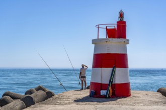 Lighthouse at the kilometre-long beach Praia da Ilha de Tavira, on the island in front of Tavira,