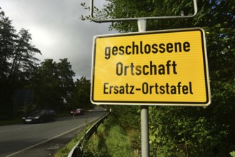 Instead of the usual place name sign, a replacement place name sign has been installed in the