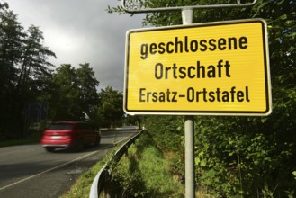 Instead of the usual place name sign, a replacement place name sign has been installed in the