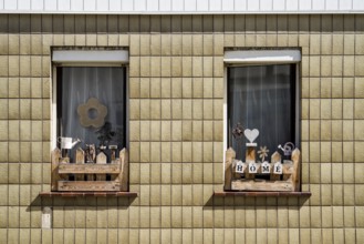 Monoton tiled house facade with decorated windows, Zierenberg, district of Kassel, Hesse, Germany
