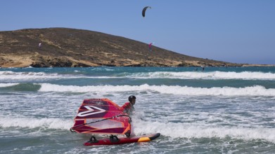Windsurfer on the water with vivid colours and clear sky, Prasonisi, beach, surf, windsurfer, kite