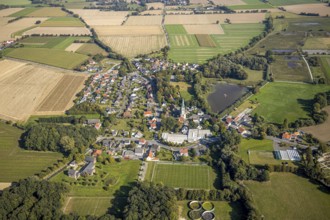 Aerial view, view of the town, St Christophorus parish church, Woestegraben pond, F. Schumacher