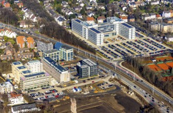 Aerial view, construction site and new construction residential quarter Seven Stones, office