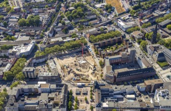 Aerial view, construction site and new building for three-part commercial building complex Viktoria