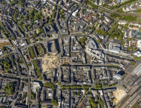 Aerial view, city centre view, construction site and new construction for three-part commercial
