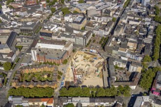 Aerial view, construction site and new building for three-part commercial building complex Viktoria
