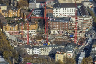 Construction site and new building for three-part commercial building complex Viktoria Karree,