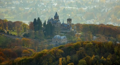 Drachenburg Castle in colourful autumn leaves, Rhine Valley, Königswinter, Siebengebierge between