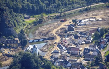 Aerial view, flooded area at the river Ahr with destroyed bridges and historical sight Burg