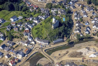 Aerial view, flooded area at the river Ahr with destroyed bridges and historical sight Burg