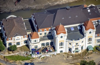Aerial view, flood area at the river Ahr with spa hotel Bad Neuenahr and furniture on the terrace