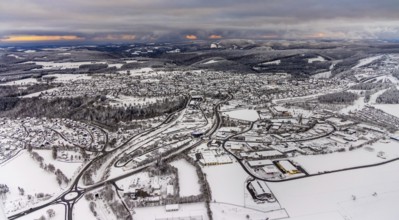Aerial view of the snowy winter landscape of Winterberg with deserted streets during the corona