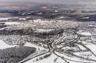 Aerial view of the snowy winter landscape of Winterberg with deserted streets during the corona
