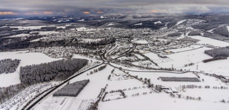 Aerial view of the snowy winter landscape of Winterberg with deserted streets during the corona