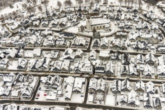 Aerial view of the snowy winter landscape of Winterberg with deserted streets during the Corona