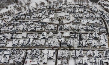 Aerial view of the snowy winter landscape of Winterberg with deserted streets during the Corona