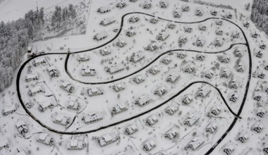 Aerial view of the snowy winter landscape of Winterberg with the deserted Landal Winterberg holiday