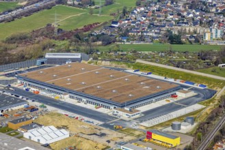 Aerial view, construction site new building Amazon logistics centre, industrial estate on