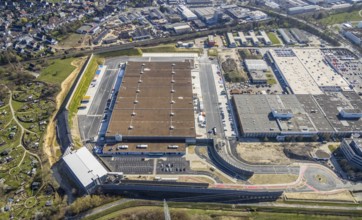 Aerial view, construction site new building Amazon logistics centre, industrial estate on