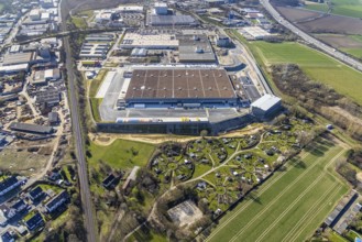 Aerial view, construction site new building Amazon logistics centre, industrial estate on