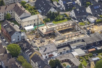 Aerial view, construction site and new building, parish hall Ruhrkirche, Heinrich-Kamp-Straße 8,
