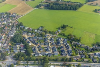 Aerial view, construction site and new construction of a housing estate Am Schwan in the district