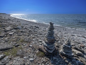 Piled up stones, on the stony Baltic Sea beach, Jordhamn, Öland, Sweden
