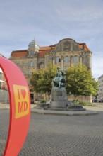 Red heart with I like MD and Otto von Guericke Fountain, monument, sculpture, inscription,