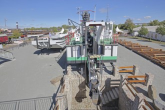 Historic dredging ship 'Otter' with shovels for dredging, open-air museum, machine, view from