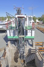 Historic dredging ship 'Otter' with shovels for dredging, open-air museum, machine, view from