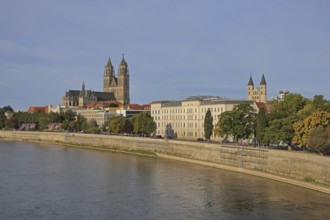 Cityscape with gothic cathedral, romanesque monastery Unser Lieben Frauen and Elbe, church towers,