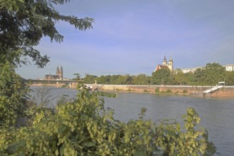 Cityscape with Gothic cathedral, New River Bridge and late Romanesque St. Johannis Church, church
