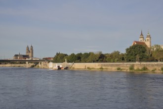 Cityscape with Gothic cathedral, New River Bridge and late Romanesque St. Johannis Church, church