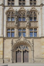 Portal with decorations and figures from the historic labour court, courthouse, entrance,