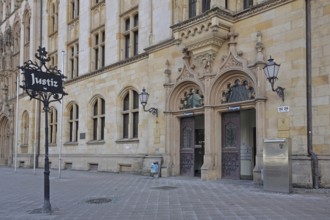 Portal of the historic labour court with sign for justice, court building, inscription, entrance