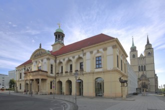 Baroque Old Town Hall built in 1713, stag column with stag statue and late Romanesque St. Johannis