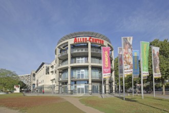 Allee-Center with flags, shopping centre, modern building, inscription, pleasure, shopping,