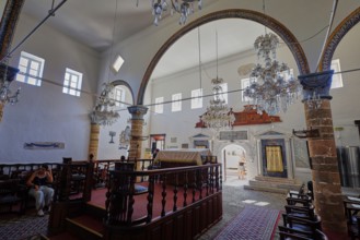 Interior view of a synagogue with chandeliers and decorative arches, Kahal Shalom Synagogue,