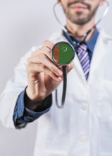 Turkmenistan health and medical insurance concept. Turkmenistan healthcare system, doctor holding